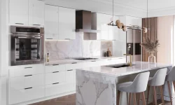 A sleek modern kitchen featuring elegant marble countertops and pristine white cabinets, showcasing contemporary design elements.