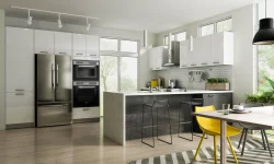 A contemporary kitchen featuring sleek white cabinets and vibrant yellow chairs, creating a bright and inviting atmosphere.