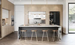 A contemporary kitchen featuring elegant marble countertops and stylish wooden cabinets, showcasing modern design elements.